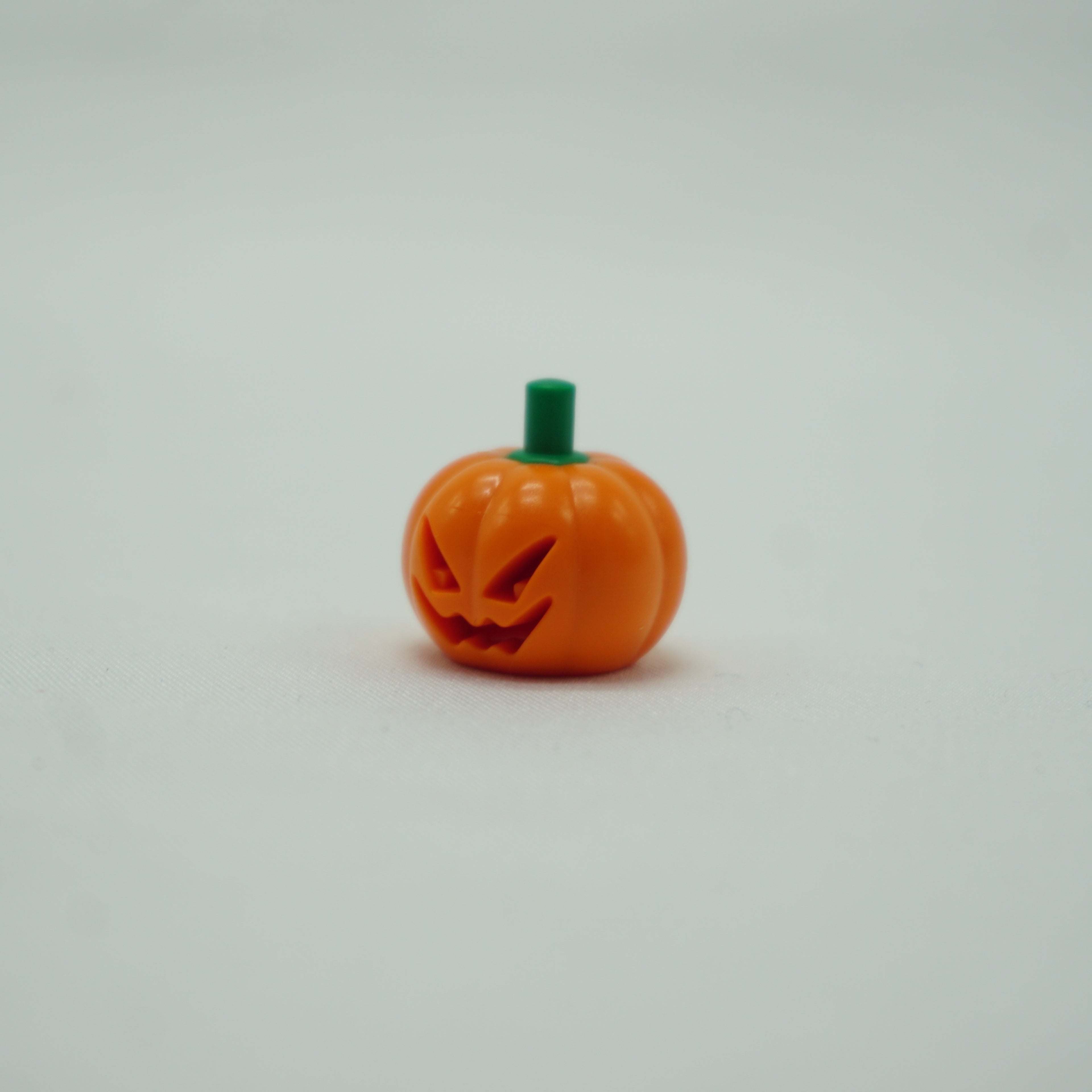 Part 20695pb01 - Minifigure, Headgear Head Cover, Pumpkin Jack O' Lantern with Molded Green Stem Pattern